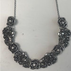 Harley Davidson sterling silver necklace featuring roses, skulls and crystals!